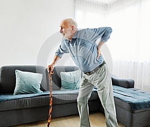 back painbackpain walking stick cane senior mature elderly heath ache backache elderly painful retirement