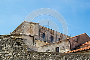 Back part of the Euphrasian Basilica also called Cathedral Basilica of the Assumption of Mary viewed from out of the wall in the