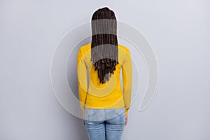 Back rear view photo of young african woman anonym new hairdo dreadlocks isolated over grey color background