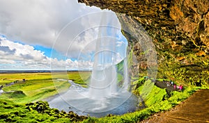 At the back of Seljalandsfoss waterfall - Iceland