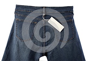 Back side of blue jeans with tag