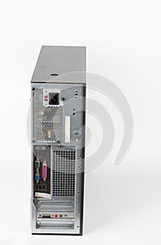 Back side of desktop PC,  tower computer case on white  background