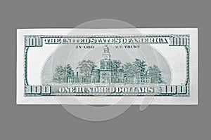 Back side of a hundred dollar bill usa on isolated gray background