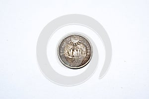 Back side of Old Indian 20 paise coin. Year 1970 vintage coin. White background