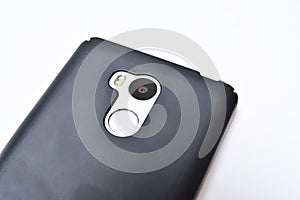 The back side of the smartphone with a camera in a case