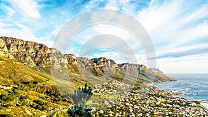 The back side of Table Mountain, called the Twelve Apostles, with the beach community of Camps Bay
