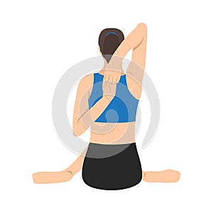 Back side of woman doing yoga exercise in cow face pose