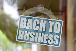 Back to business - Open sign photo