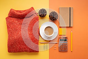 Back to office concept with supplies, coffee and sweater