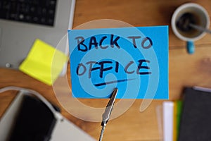 Back to office written on a memo