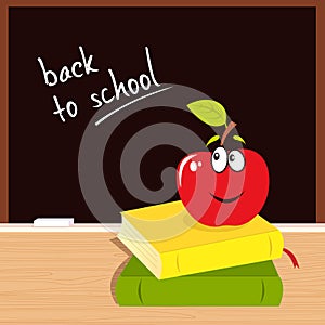 Back to school: apple, books and black board