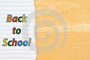 Back to School background with lined paper on a desk