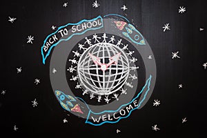 Back to school background with spaceships with flags with titles ` Back to school` and `welcome` are flying around Earth