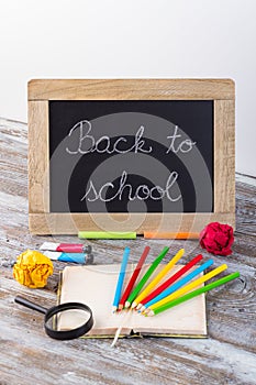 Back to school background with special school supplies, end of h