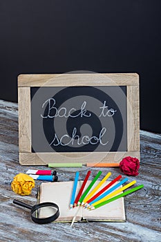 Back to school background with special school supplies, end of h