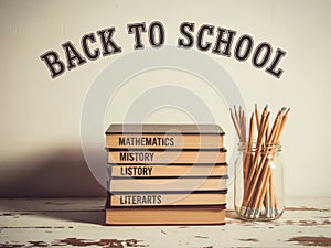 Back to school books stack isolated on white background