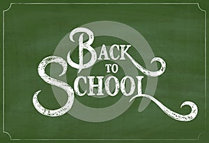 Back to School Chalk Hand Drawing Greeting Card over Green Chalkboard