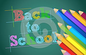 Back to school with colors pencils over chalkboard