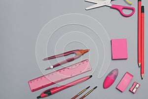 Back to school concept background with pink school accessories