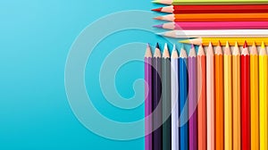 Back to school concept, colorful pencils isolated on blue background copy space, top view, teacher\'s day promotion banner