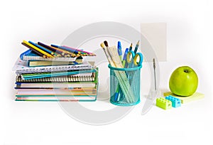 Back to school concept. Notebook stack and school pencils. Schoolchild and student studies accessories.