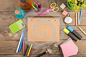 Back to school concept - school supplies on the wooden desk