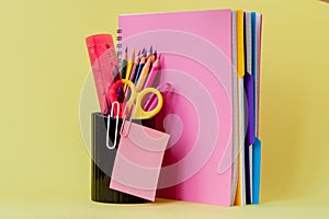 Back to school concept with space for text. Copy space. School office supplies.Creative desk with colourful stationery. Colored