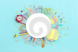Back to school concept. Top view image of student stationery over pastel blue background