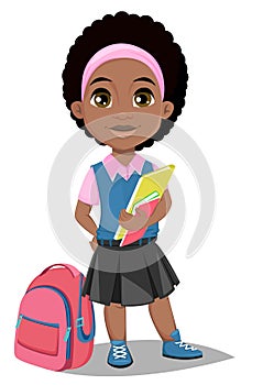 Back to school. Cute Afro-American girl with books in casual clothes stands near schoolbag