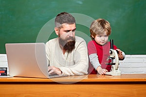 Back to school and Education concept. Father and son. Parent Teacher. First day in school. father teaching her son in