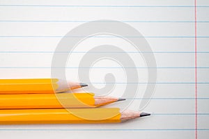 Back to school, education concept with orange pencils close up and composition book on background for educational new academic yea