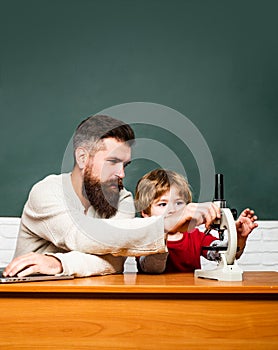 Back to school. Elementary school. Happy family - daddy and son together. Concept of education and teaching. Daddy and