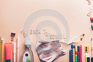 Back to school with face masks and sanitizer