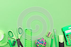 Back to School Green Background witch Office Supplies,Flat Lay
