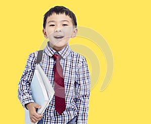 Back to school. Happy child student holding books