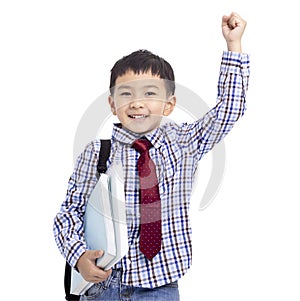 Back to school. Happy Schoolboy student raising the arm