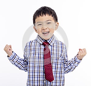 Back to school. Happy Schoolboy student raising the arm photo