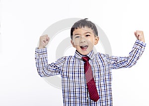 Back to school. Happy Schoolboy student raising the arm