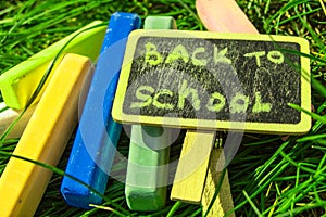 Back to school, the inscription on the mini-Board, the layout of the Board and chalk on the green grass, the concept of