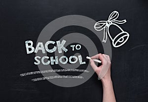 Back to school lettering on blackboard