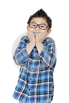 Back to school. Little child in glasses feels like shock when time to school on white background