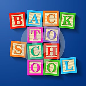 Back to School phrase compiled with wooden alphabet blocks