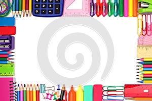 Back to School school supplies frame against a white background