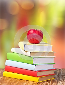 Back to school september holiday background stack books apple.