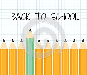 Back to school. A set of pencils on a background of notebook