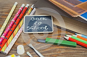 Back to school sign on chalkboard