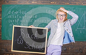 Back to school special offer. Special offer discount sale school season. Woman teacher holds blackboard back to school