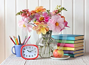 Back to school. still life with a bouquet of dahlias