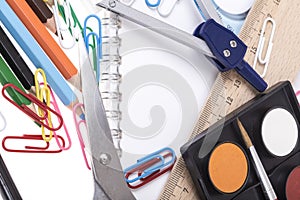 Back to school template with stationery and notebook on white