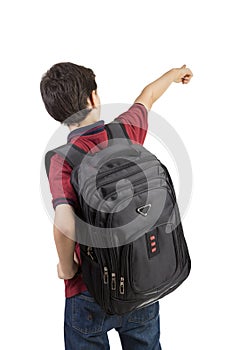 Back to school - Back view of school boy child with school backpack pointing photo